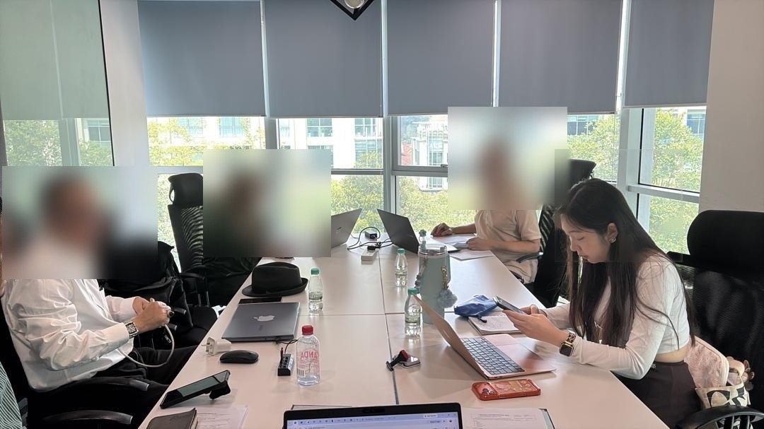 AA Alive consultants in a client planning meeting around a boardroom table